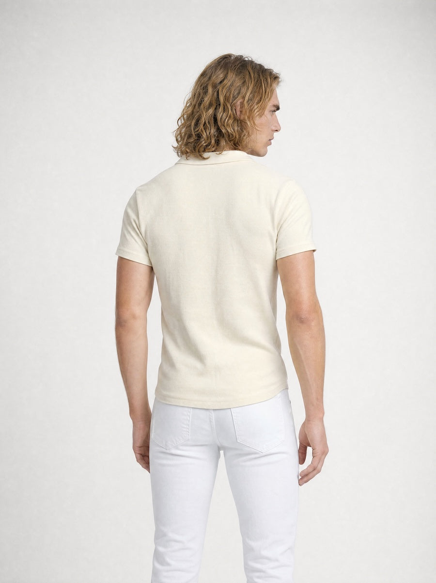 Back profile of MONFRÈRE Bond Polo Taupe men's off white ivory stretch viscose polo shirt.