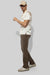 Model wearing MONFRÈRE Bond Shirt Silk Ivory men's off white ivory stretch viscose silk bowling shirt.
