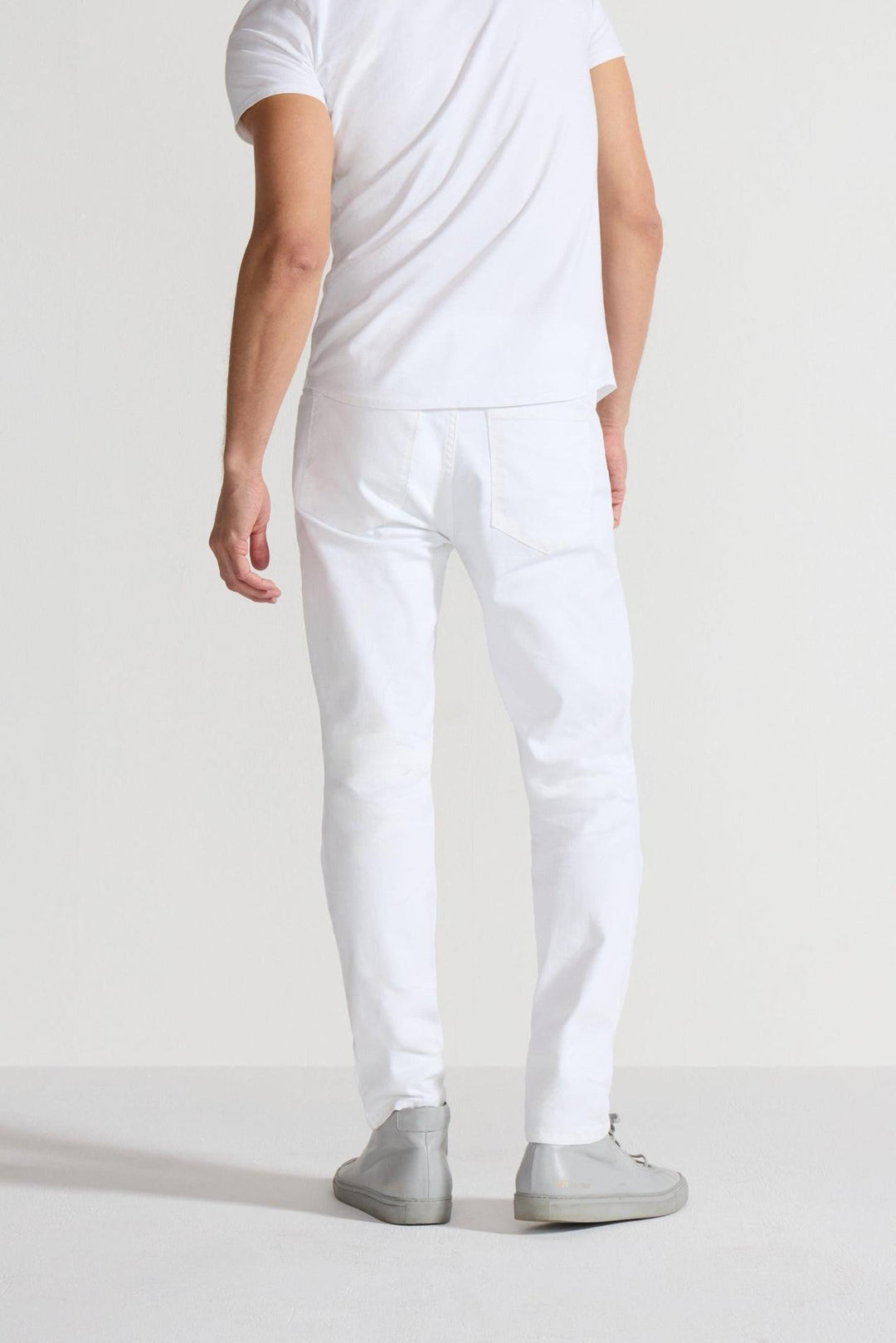 Back profile of MONFRÈRE Brando Blanc men's white Japanese stretch denim five pocket slim jean.