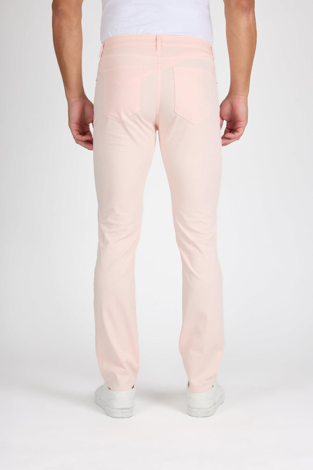 Back profile of MONFRÈRE Brando Coral men's pink stretch twill five pocket slim jean.