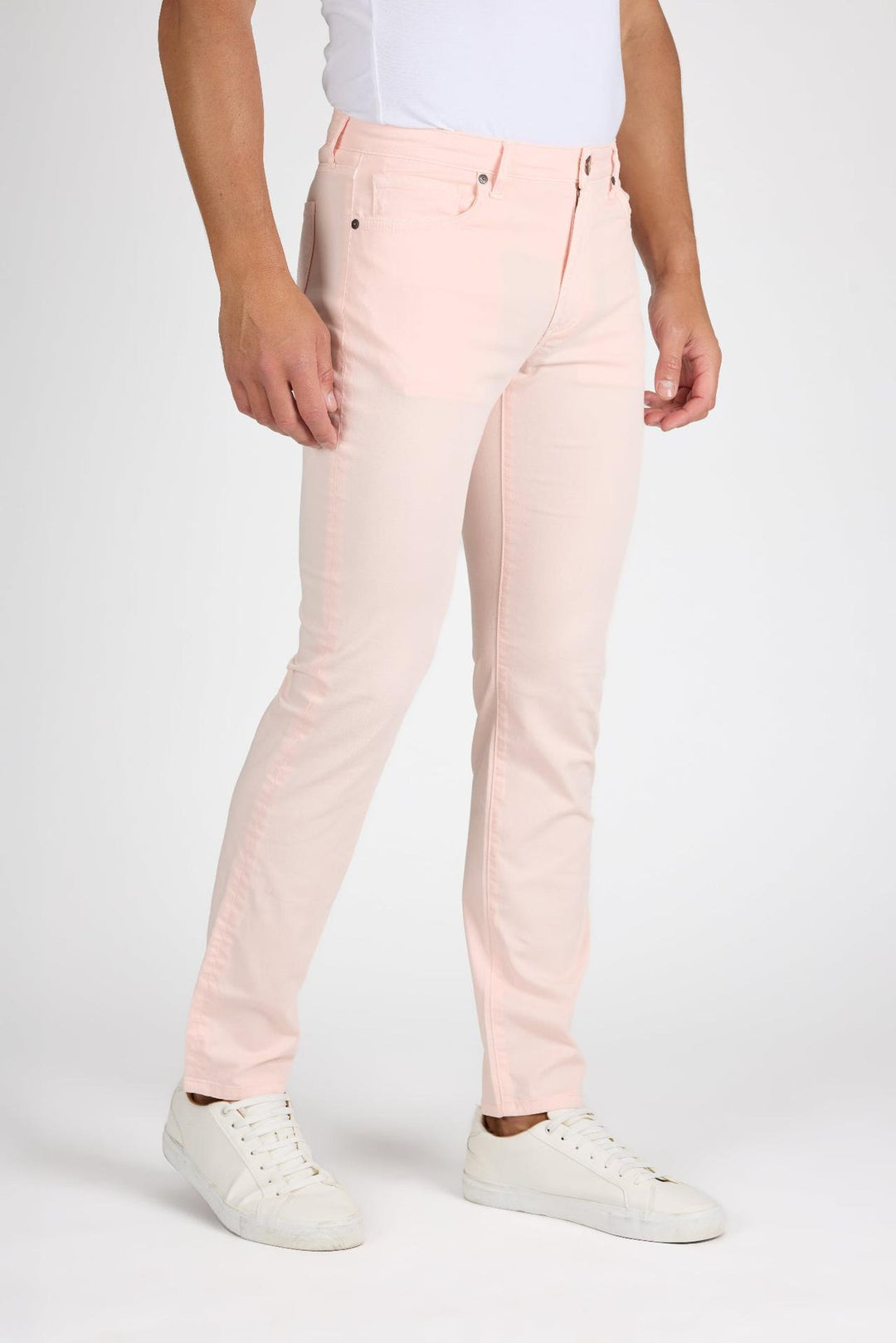 Side profile of MONFRÈRE Brando Coral men's pink stretch twill five pocket slim jean.