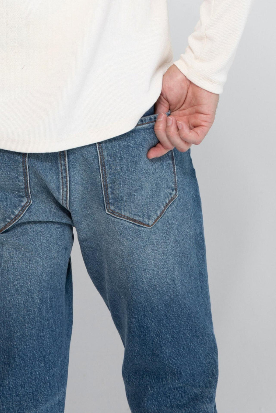 Close up of view MONFRÈRE Brando Encino men's blue stretch rigid vintage denim five pocket slim jean.