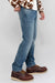 Side profile of MONFRÈRE Brando Encino men's blue stretch rigid vintage denim five pocket slim jean.