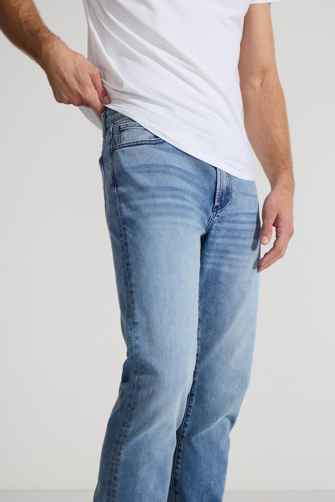 Close up of view MONFRÈRE Brando Florentine men's blue Japanese stretch denim five pocket slim jean.