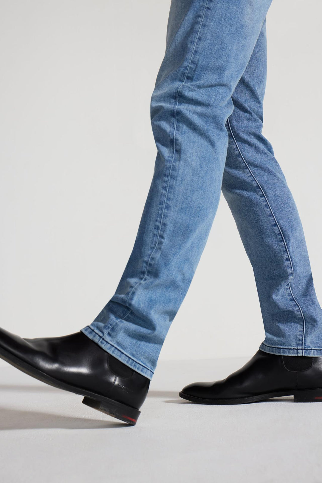 Detail view of MONFRÈRE Brando Florentine men's blue Japanese stretch denim five pocket slim jean.