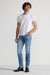 Model wearing MONFRÈRE Brando Florentine men's blue Japanese stretch denim five pocket slim jean.