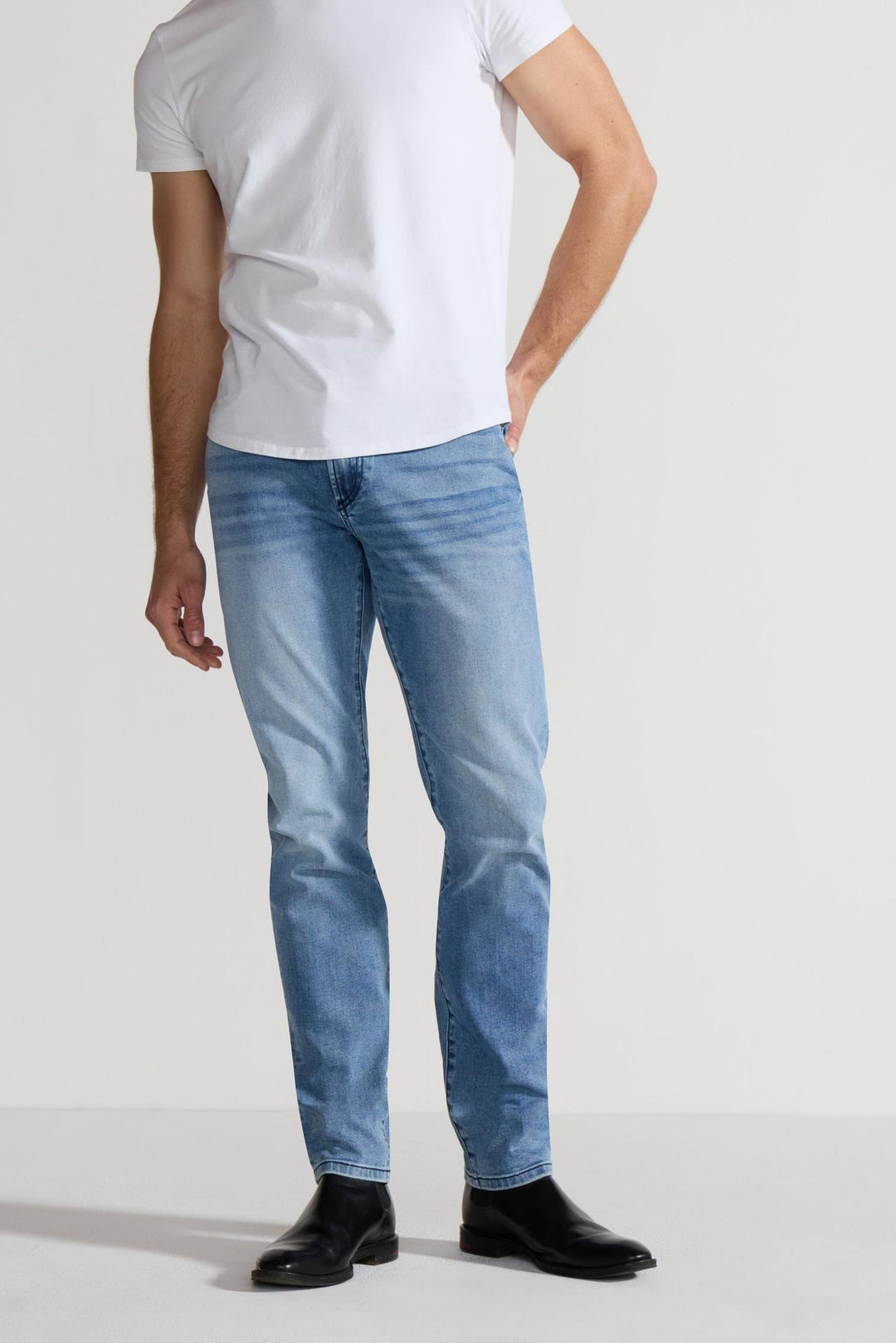 Front profile of MONFRÈRE Brando Florentine men's blue Japanese stretch denim five pocket slim jean.