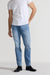 Front profile of MONFRÈRE Brando Florentine men's blue Japanese stretch denim five pocket slim jean.