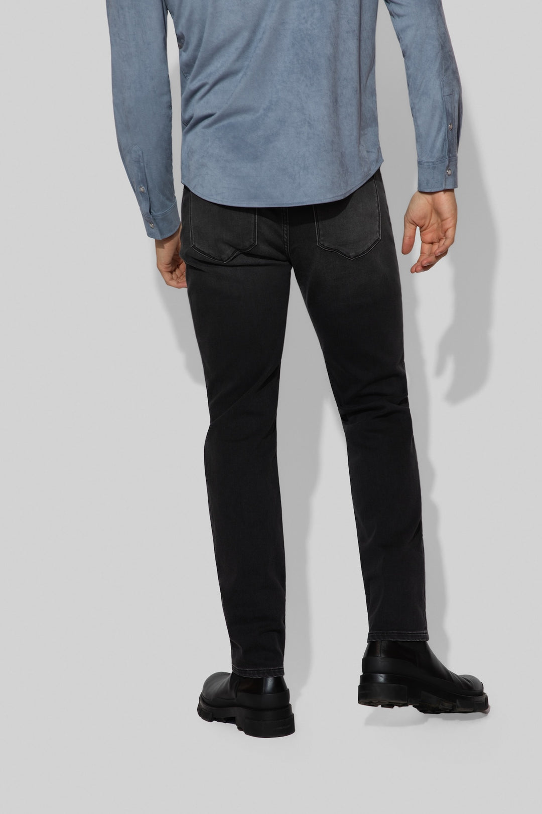 Back profile of MONFRÈRE Brando French Terry Matter men's dark grey French Terry denim five pocket slim jean.
