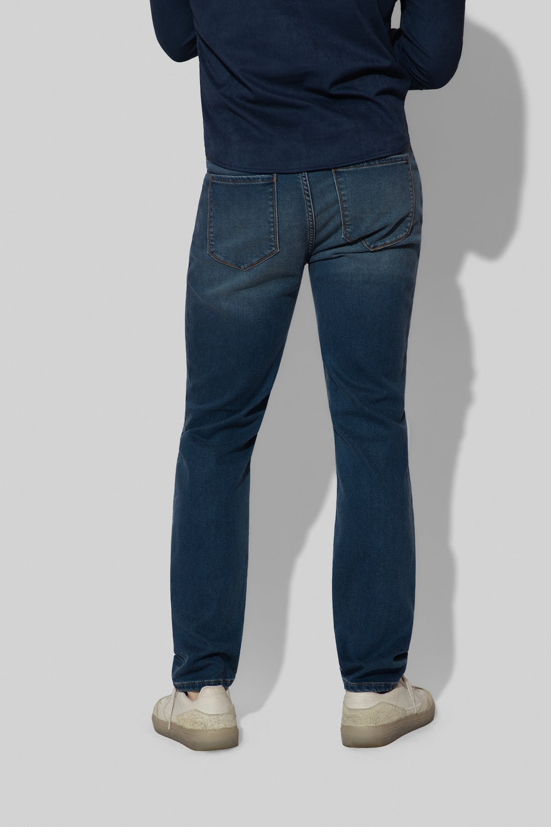 Back profile of MONFRÈRE Brando French Terry Rodeo men's blue French Terry denim five pocket slim jean.