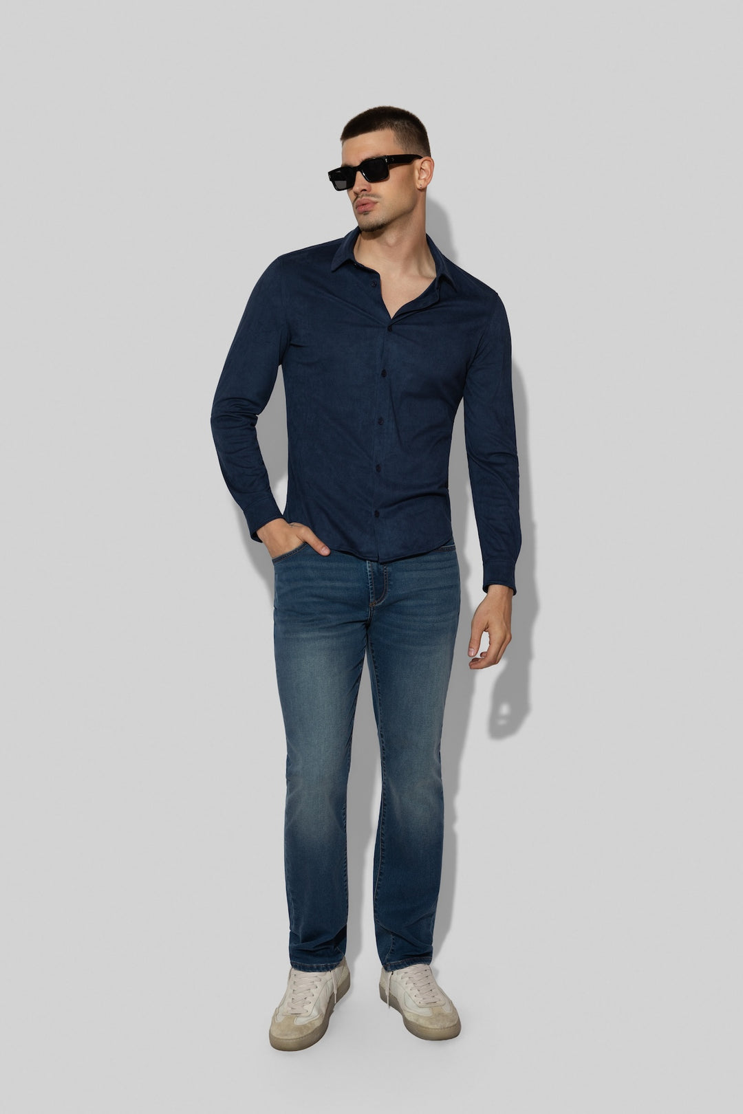 Model wearing MONFRÈRE Brando French Terry Rodeo men's blue French Terry denim five pocket slim jean.