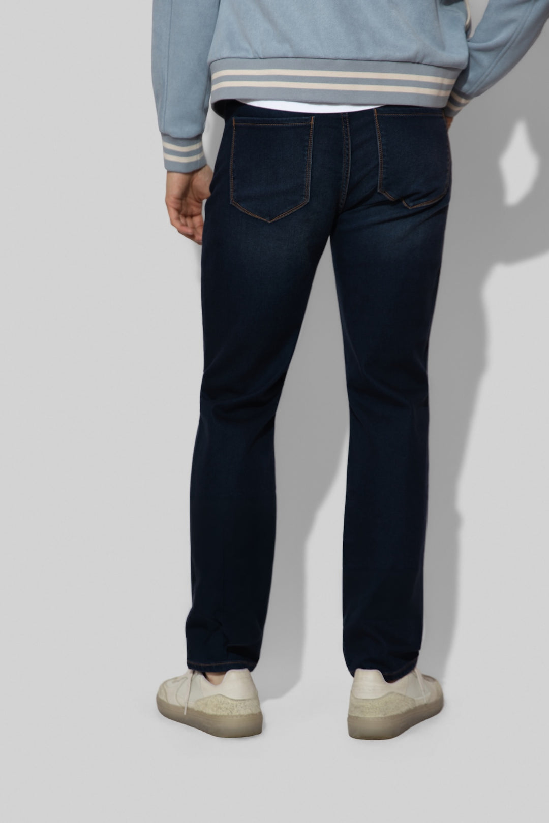 Back profile of MONFRÈRE Brando French Terry Wrangler men's dark blue French Terry denim five pocket slim jean.