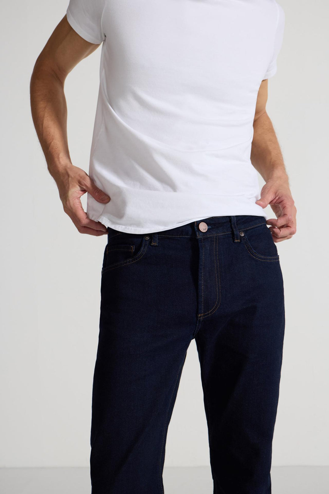 Close up of view MONFRÈRE Brando Indigo men's dark blue Japanese stretch denim five pocket slim jean.