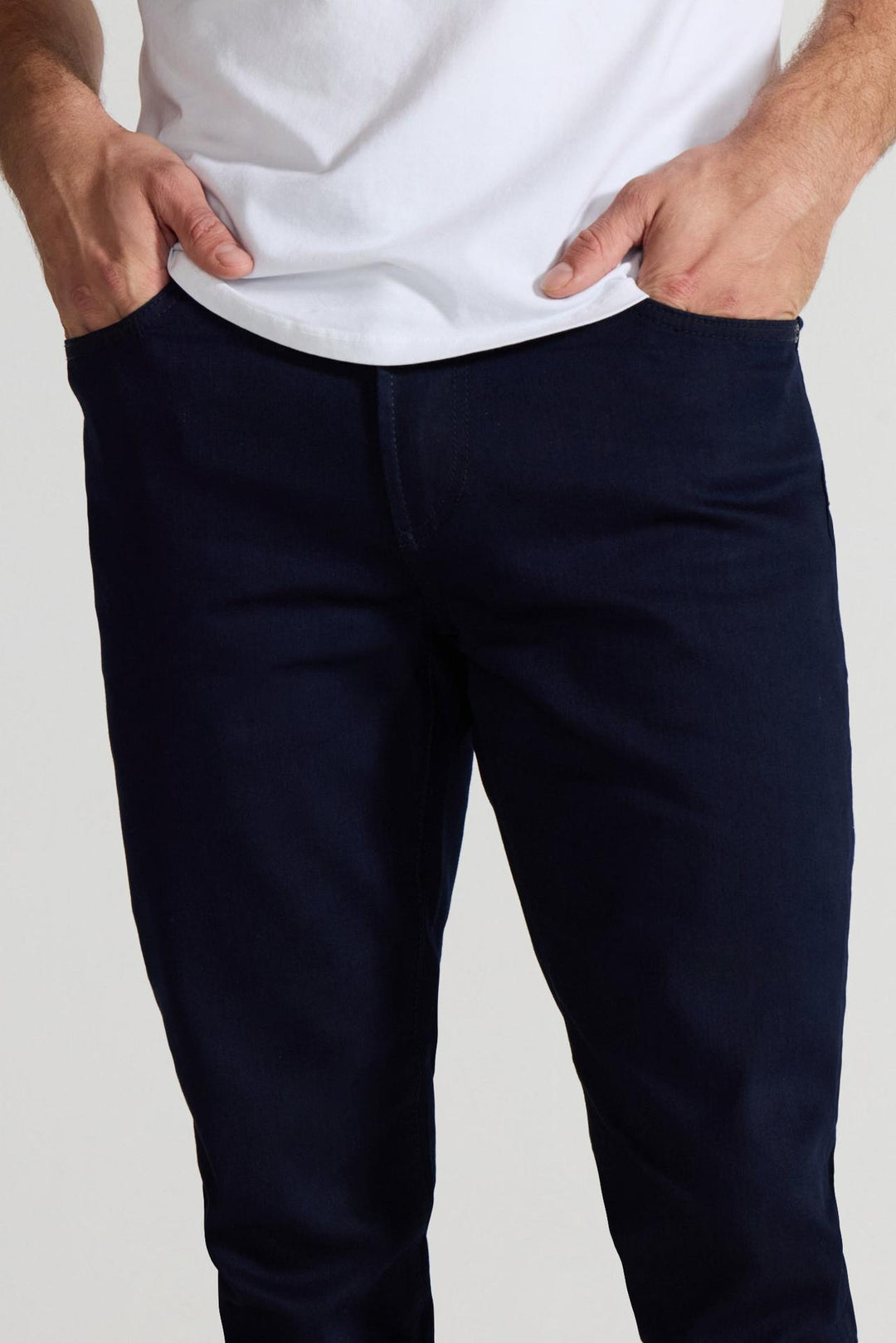 Close up of view MONFRÈRE Brando Ink men's dark blue navy Japanese stretch denim five pocket slim jean.
