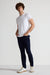 Model wearing MONFRÈRE Brando Ink men's dark blue navy Japanese stretch denim five pocket slim jean.