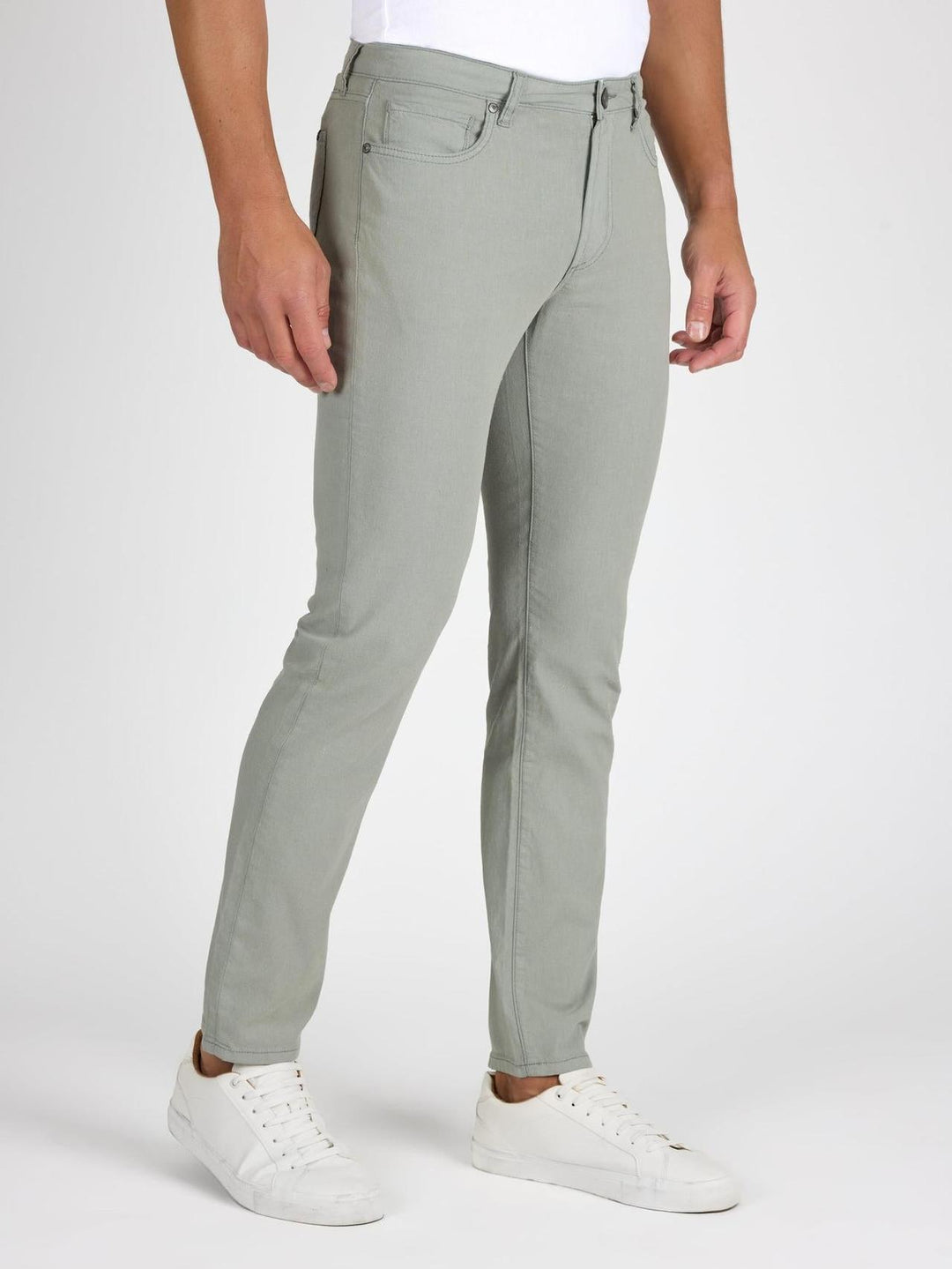 Side profile of MONFRÈRE Brando Jade men's green stretch twill five pocket slim jean.