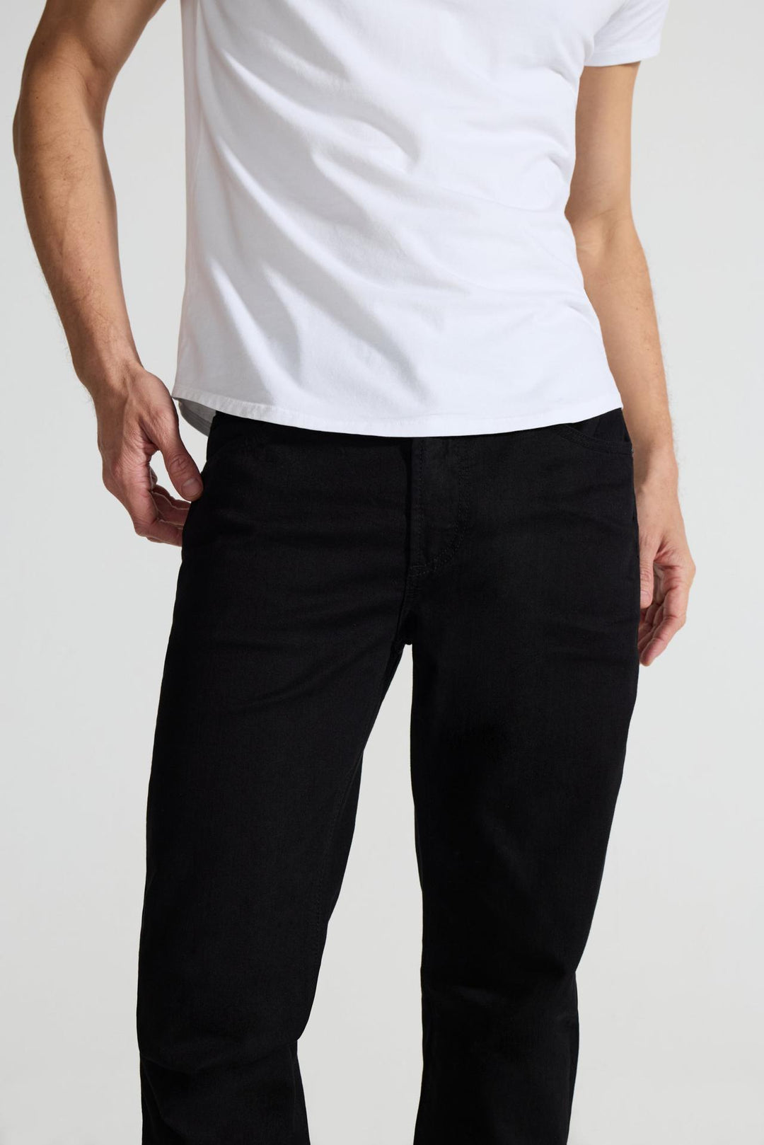 Close up of view MONFRÈRE Brando Noir men's black Japanese stretch denim five pocket slim jean.