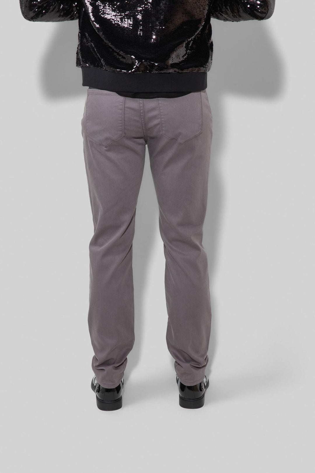 Back profile of MONFRÈRE Brando Parisian Luxe Eiffel Tower men's grey soft stretch twill five pocket slim jean.