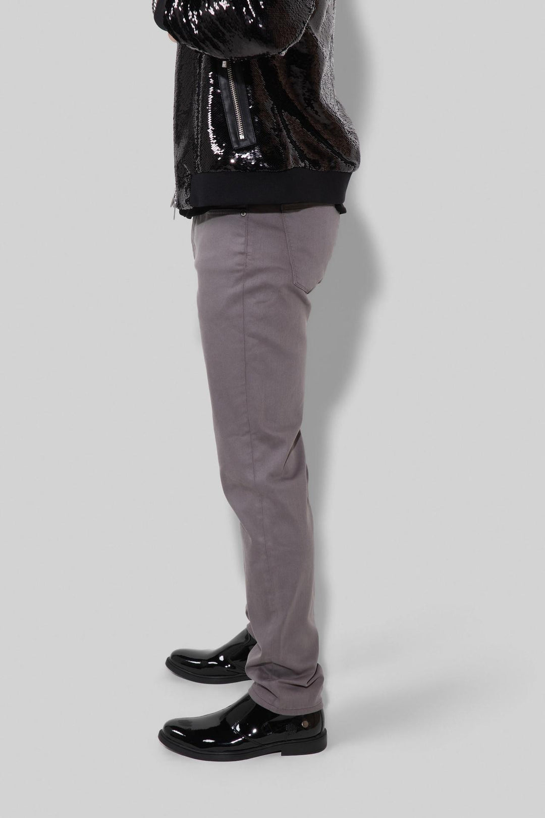 Side profile of MONFRÈRE Brando Parisian Luxe Eiffel Tower men's grey soft stretch twill five pocket slim jean.