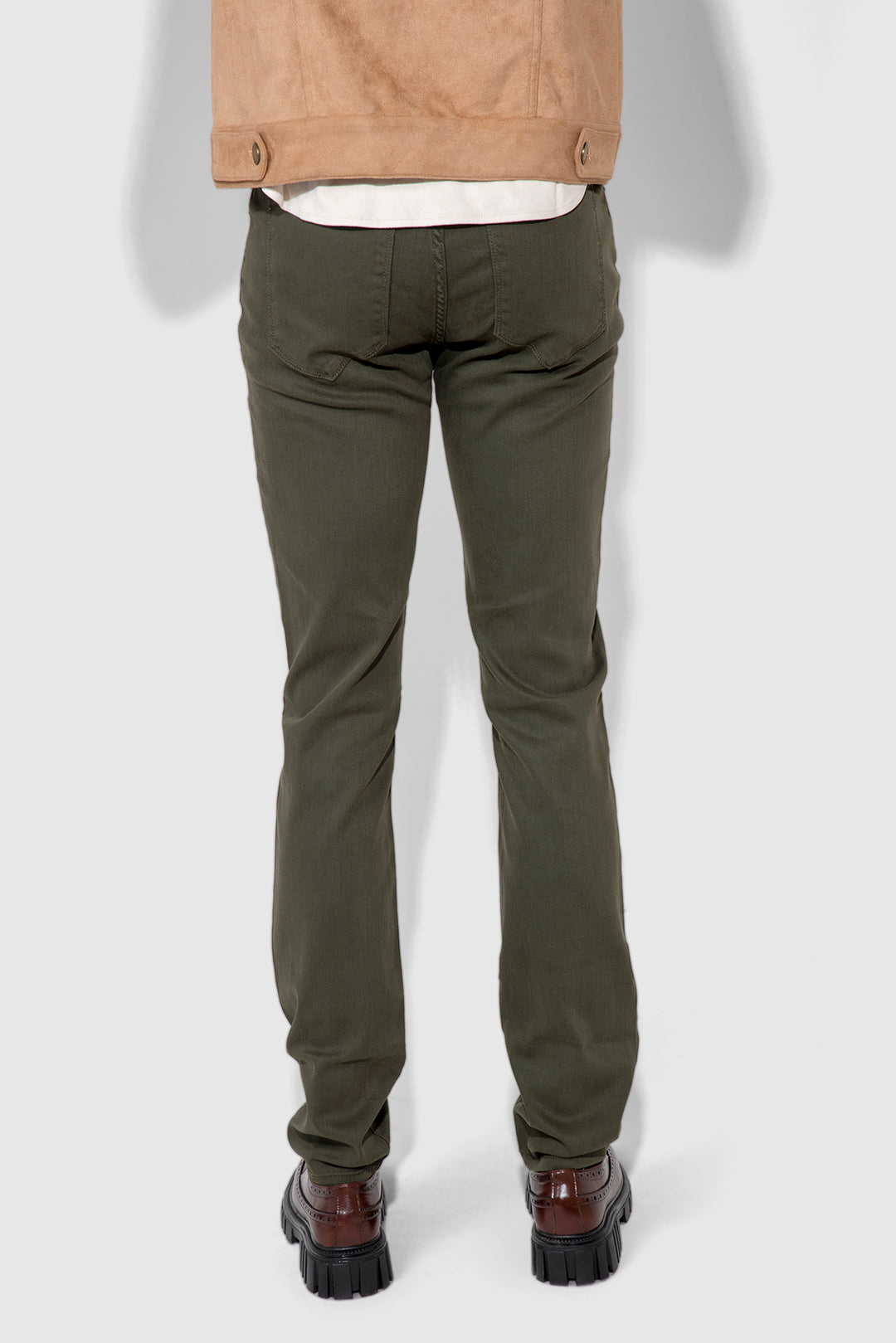 Back profile of MONFRÈRE Brando Parisian Luxe Juniper men's green soft stretch twill five pocket slim jean.