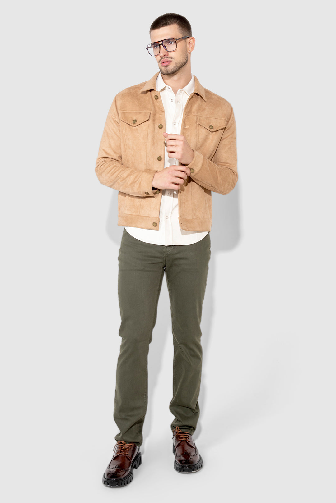 Model wearing MONFRÈRE Brando Parisian Luxe Juniper men's green soft stretch twill five pocket slim jean.