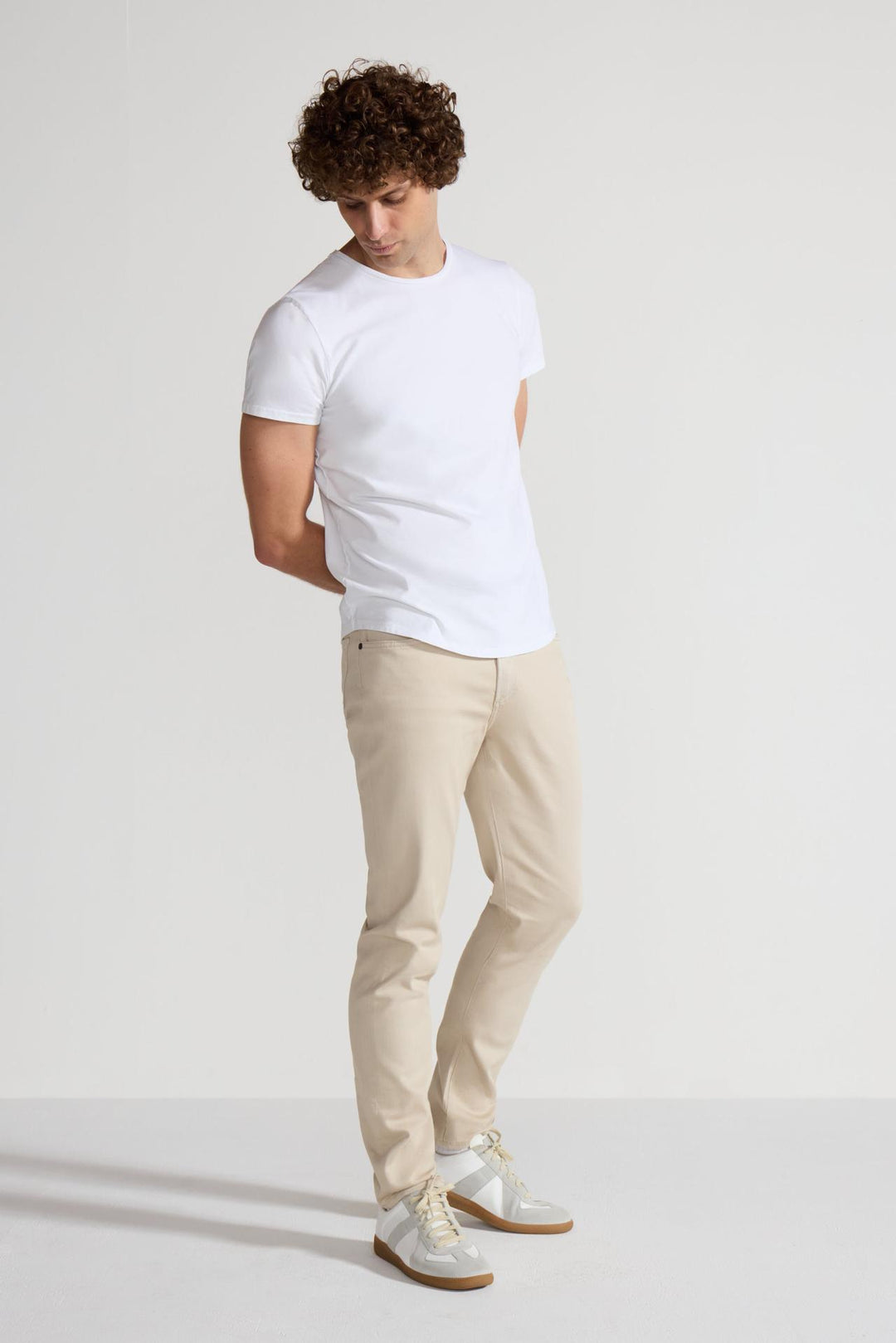 Side profile of MONFRÈRE Brando Parisian Luxe Khaki men's khaki soft stretch twill five pocket slim jean.