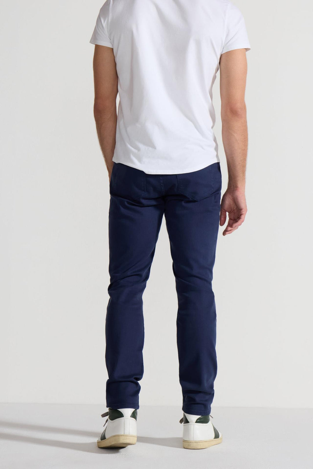 Back profile of MONFRÈRE Brando Parisian Luxe Navy men's blue soft stretch twill five pocket slim jean.