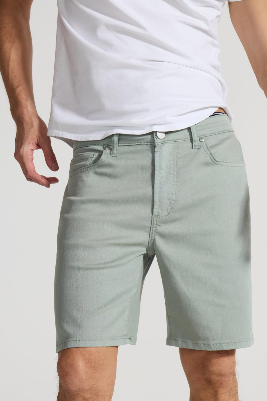 Detail view of MONFRÈRE Brando Short Mineral Green men's green soft stretch twill five pocket short.