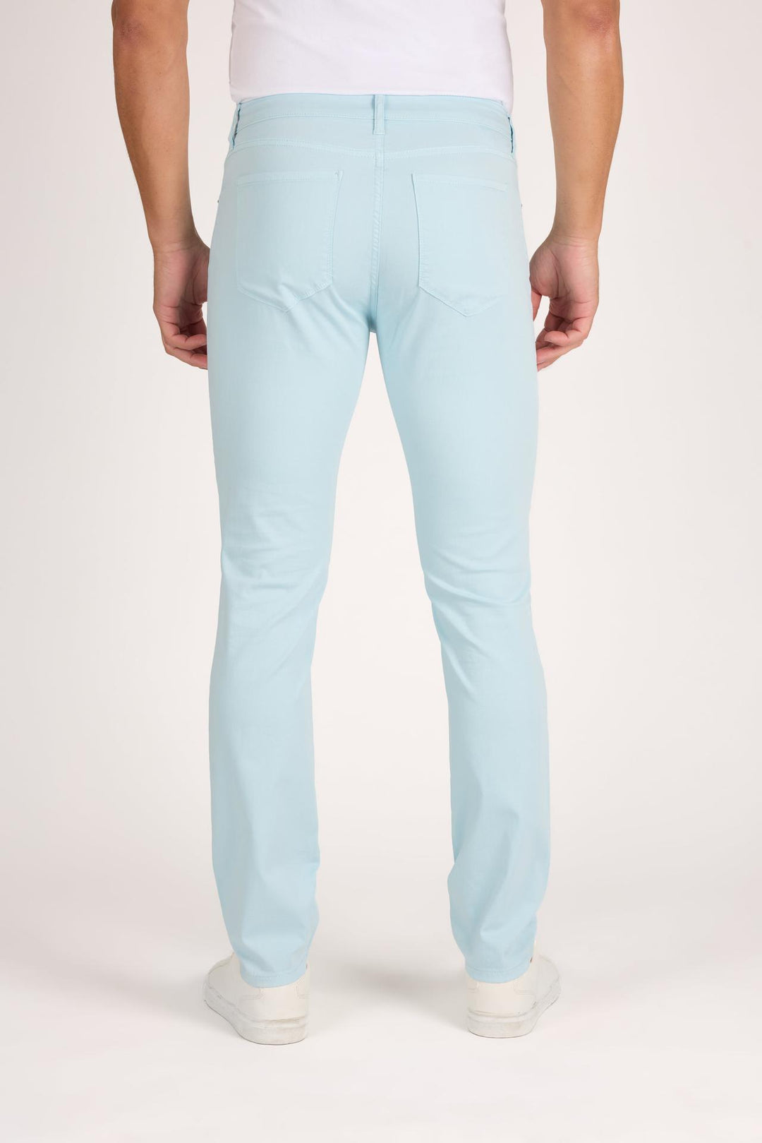 Back profile of MONFRÈRE Brando St Barth's men's light blue stretch twill five pocket slim jean.