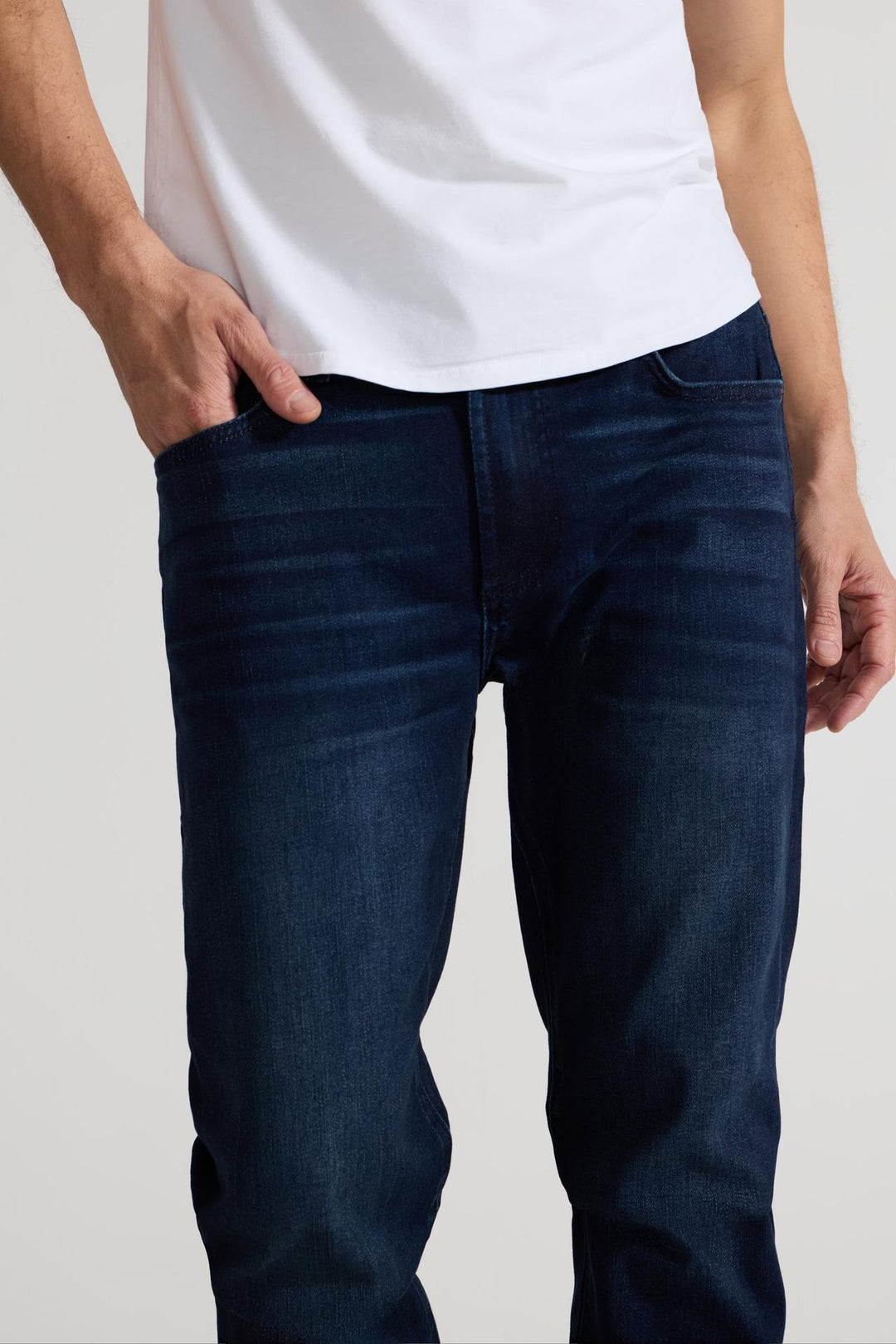Close up of view MONFRÈRE Brando Vail men's dark blue Japanese stretch denim five pocket slim jean.