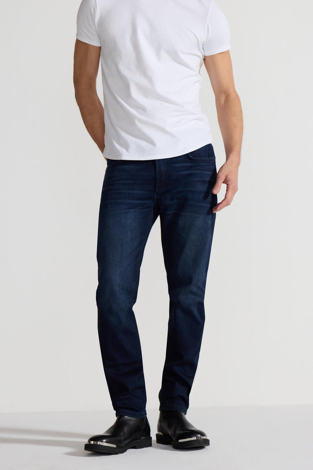 Front profile of MONFRÈRE Brando Vail men's dark blue Japanese stretch denim five pocket slim jean.