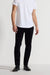 Front profile of MONFRÈRE Brando Velvet Noir men's black velveteen stretch fabric five pocket slim jean.