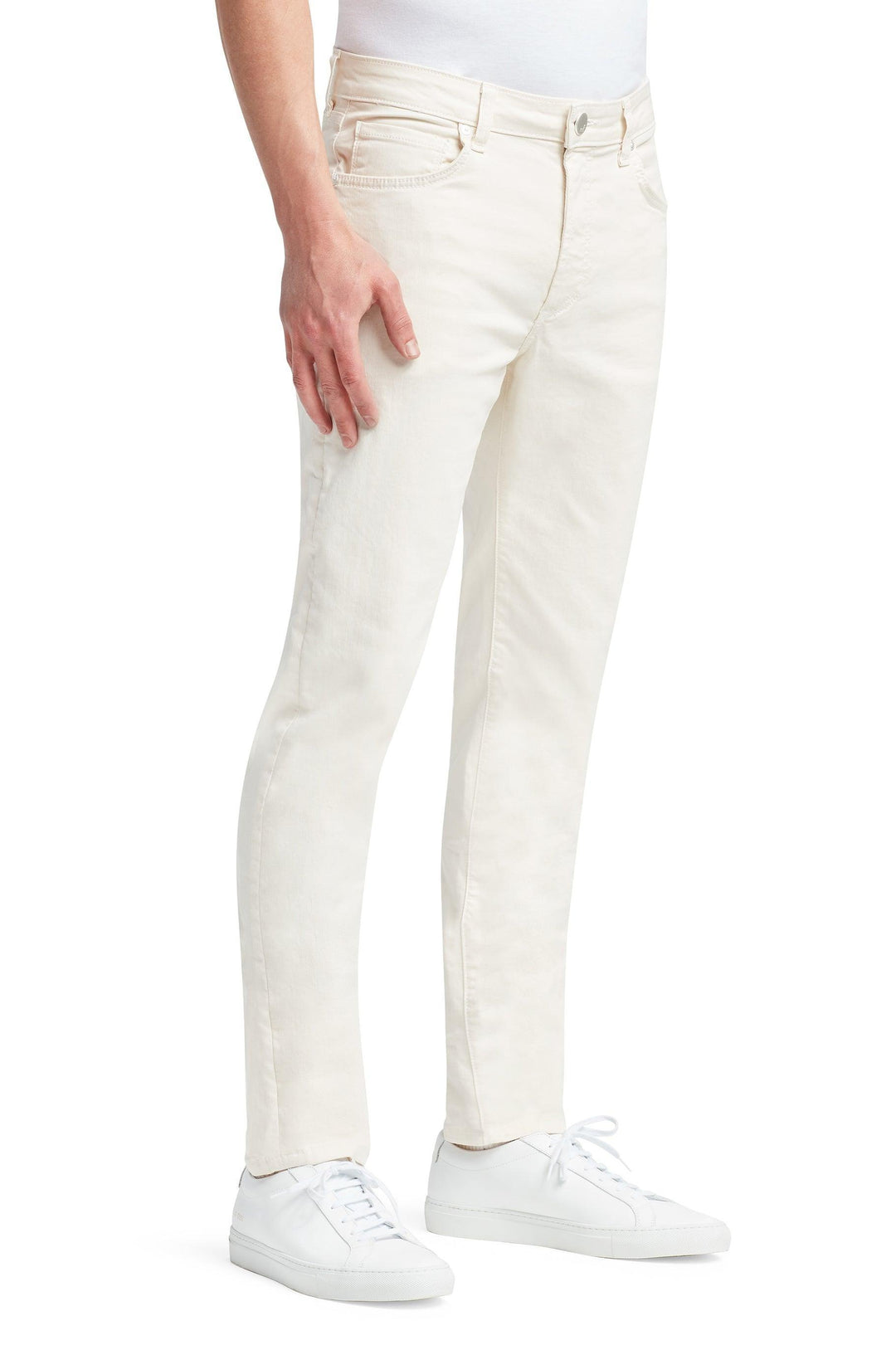 Side profile of MONFRÈRE Brando Vintage Blanc men's off white ivory Japanese stretch denim five pocket slim jean.