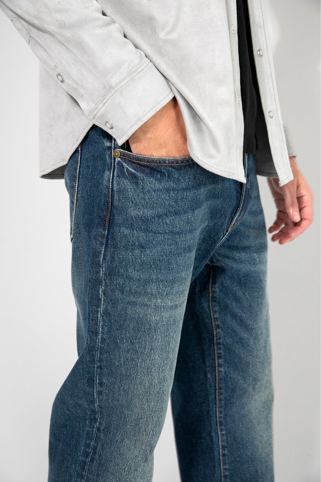Detail view of MONFRÈRE Caine Clichy men's blue stretch rigid vintage denim five pocket straight leg relaxed jean.