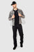 Model wearing MONFRÈRE Caine Noir men's black Japanese stretch denim five pocket straight leg relaxed jean.