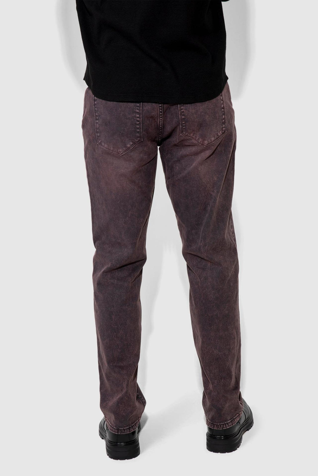 Back profile of MONFRÈRE Caine Vintage Plum men's purple stretch sateen twill five pocket straight leg relaxed jean.