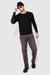 Model wearing MONFRÈRE Caine Vintage Plum men's purple stretch sateen twill five pocket straight leg relaxed jean.