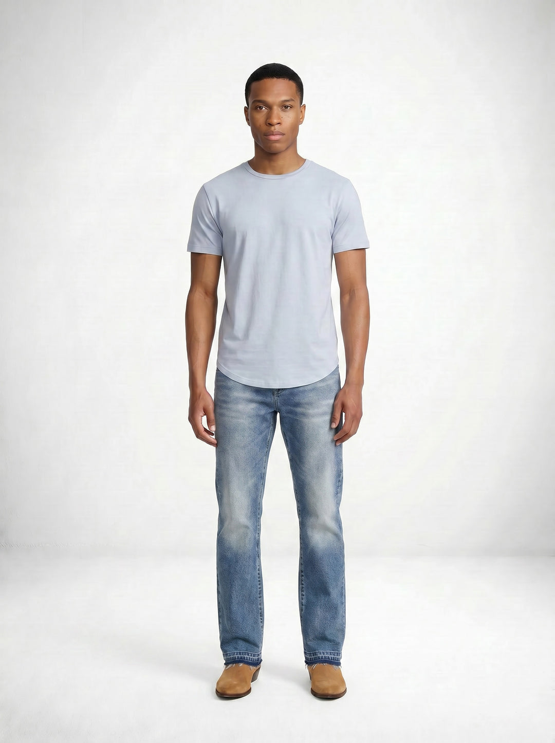 Model wearing MONFRÈRE Clint Aura men's blue rigid denim bootcut jean.