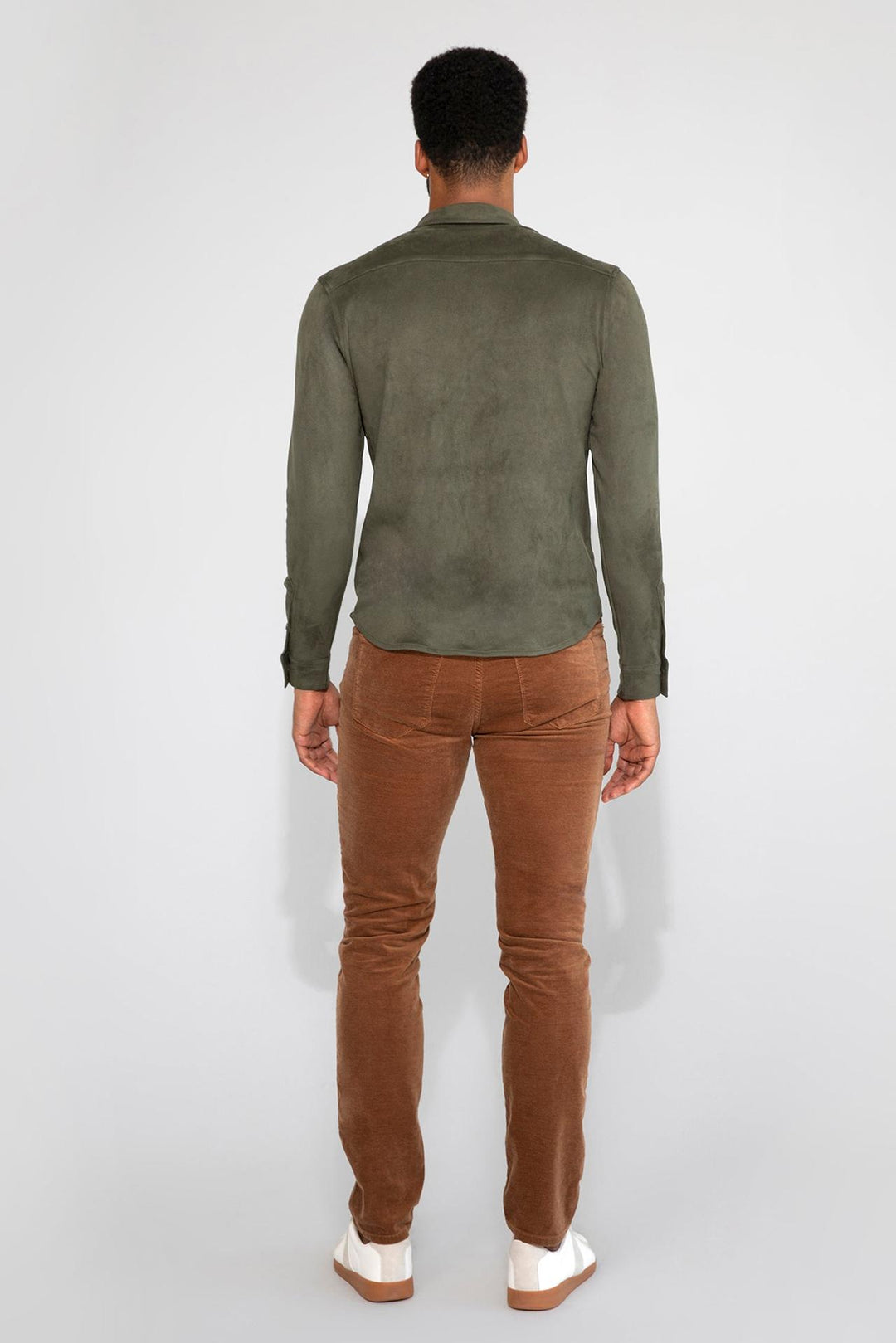 Back profile of MONFRÈRE Cooper Butter Suede Juniper men's green soft faux suede stretch fabric button down shirt.
