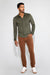 Model wearing MONFRÈRE Cooper Butter Suede Juniper men's green soft faux suede stretch fabric button down shirt.