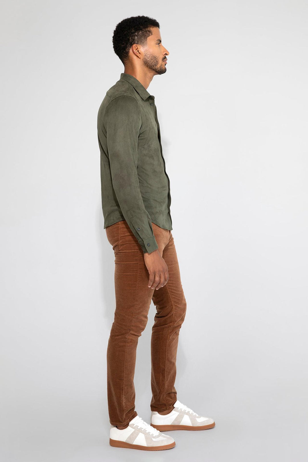 Side profile of MONFRÈRE Cooper Butter Suede Juniper men's green soft faux suede stretch fabric button down shirt.