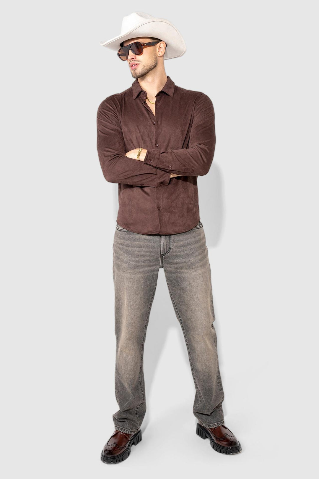 Model wearing MONFRÈRE Cooper Butter Suede Espresso men's brown soft faux suede stretch fabric button down shirt.