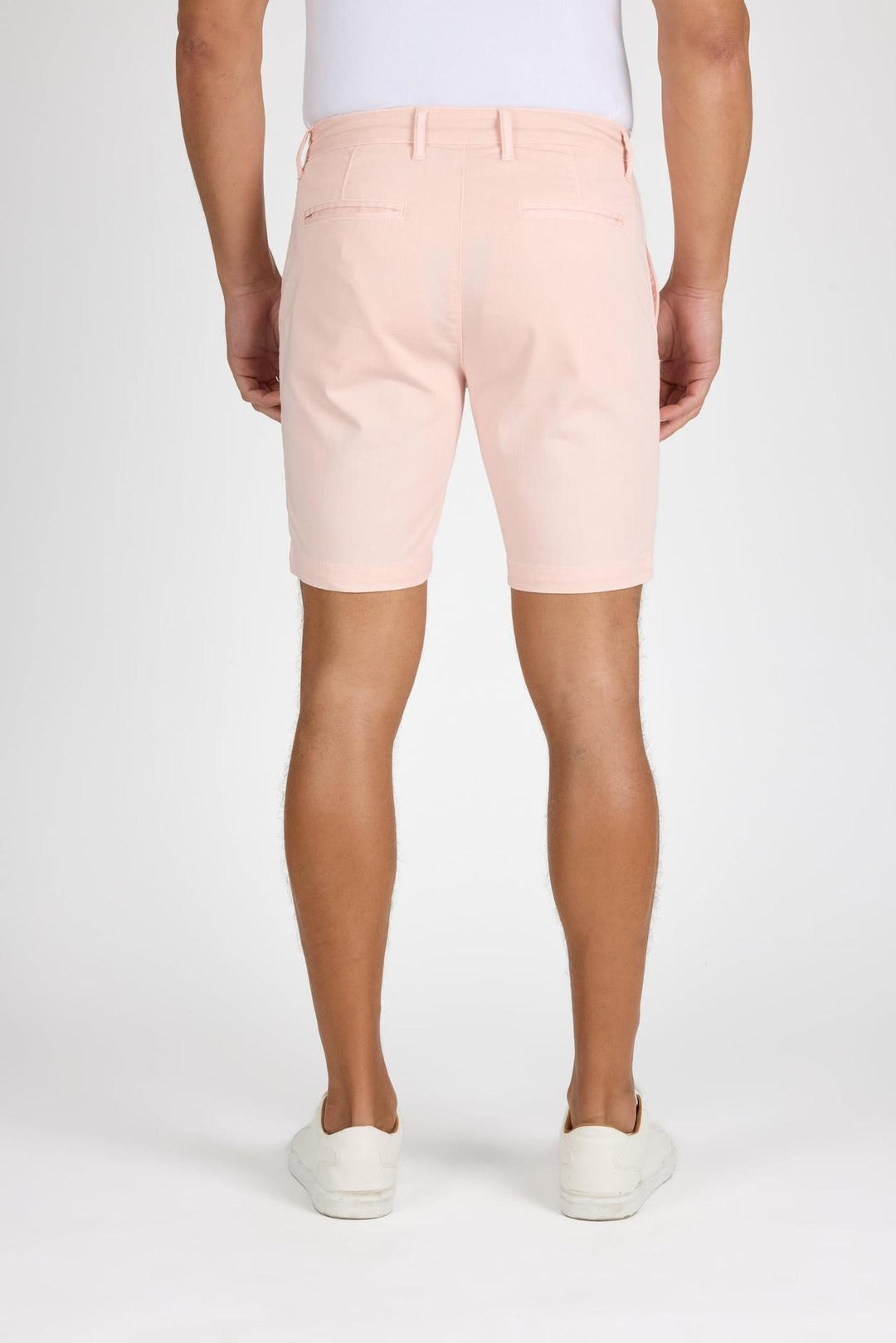 Back profile of MONFRÈRE Cruise Coral men's pink Japanese tencel twill chino short.