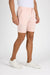 Side profile of MONFRÈRE Cruise Coral men's pink Japanese tencel twill chino short.