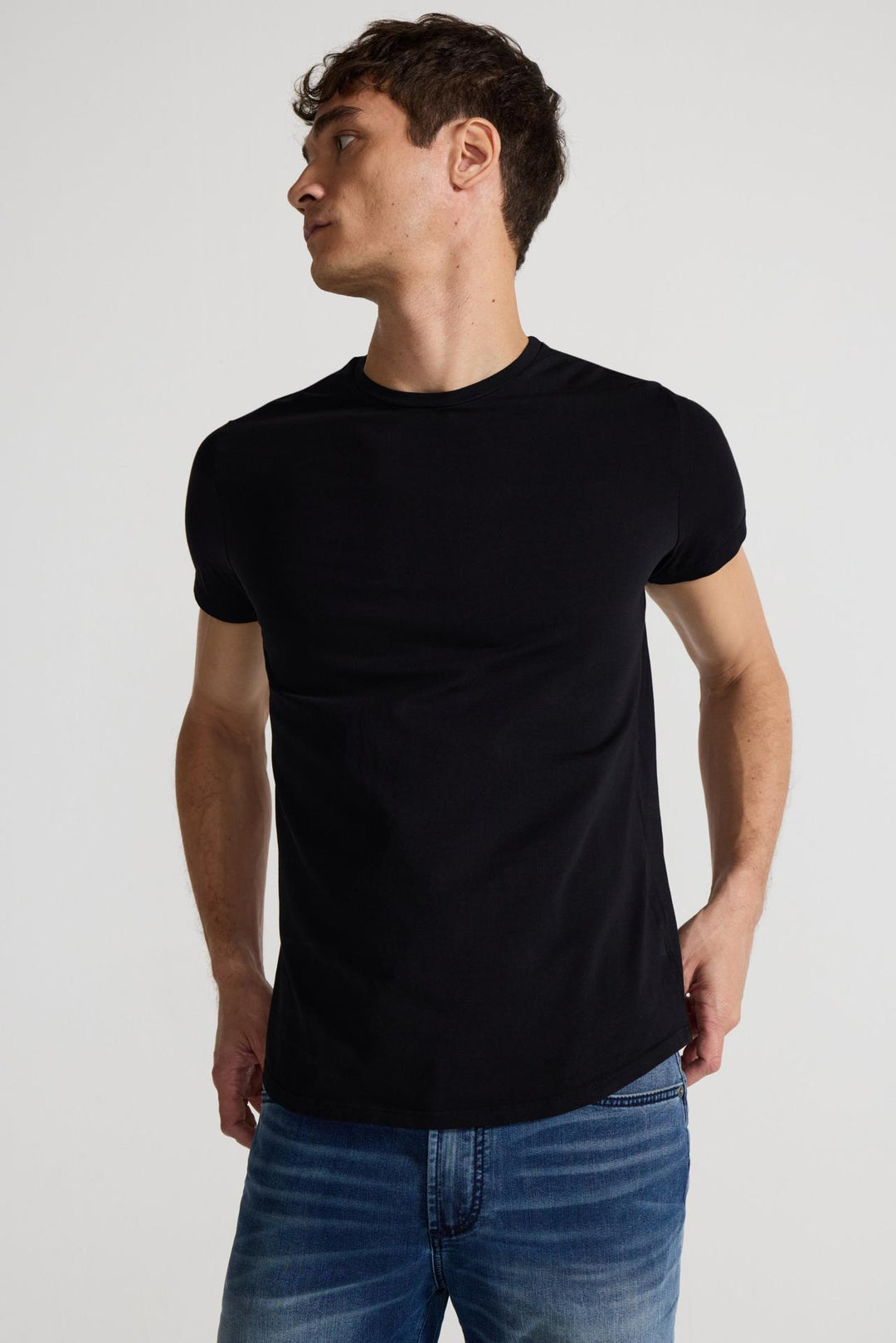 Detail view of MONFRÈRE Dann Noir men's black stretch jersey knit short sleeve t-shirt.