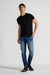 Model wearing MONFRÈRE Dann Noir men's black stretch jersey knit short sleeve t-shirt.