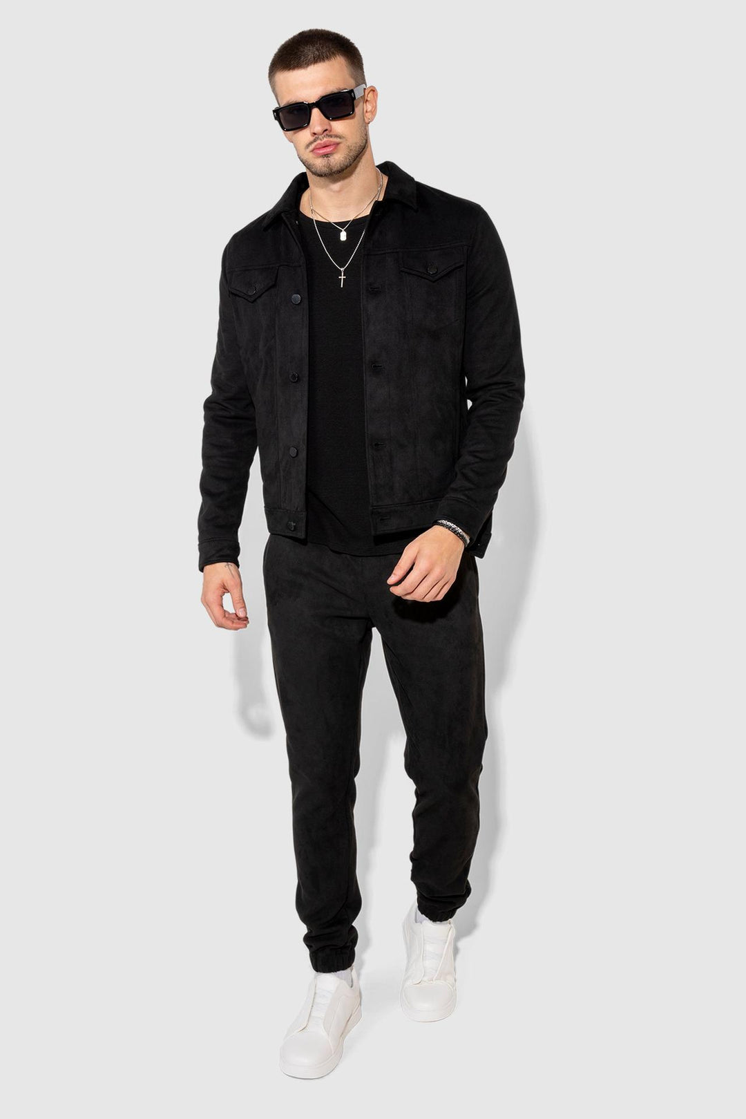 Model wearing MONFRÈRE Dean Butter Suede Noir men's black soft faux suede stretch fabric trucker jacket.