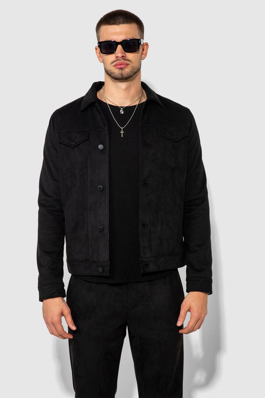Front profile of MONFRÈRE Dean Butter Suede Noir men's black soft faux suede stretch fabric trucker jacket.