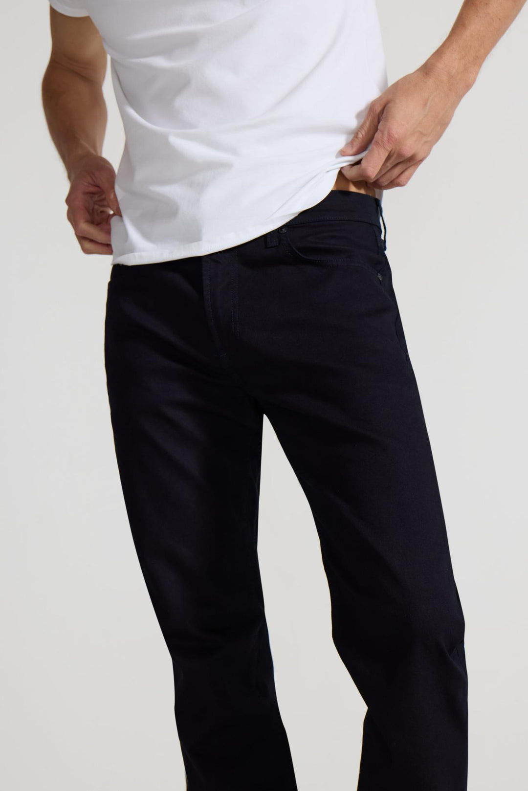 Detail view of MONFRÈRE Deniro Ink men's dark blue navy Japanese stretch denim five pocket slim straight jean.