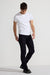 Model wearing MONFRÈRE Deniro Ink men's dark blue navy Japanese stretch denim five pocket slim straight jean.